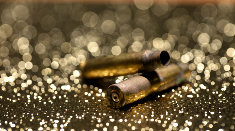 Image of bullet casings on the ground, Issa Castro Law Firm.