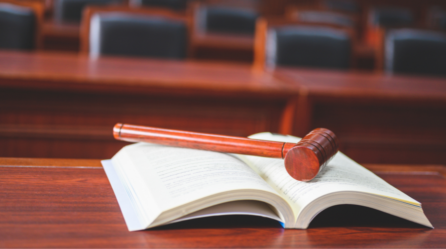 Judges Hammer on a book Image of a judges desk in Atlanta, Atlanta Personal Injury Lawyer - Issa Castro Law Firm