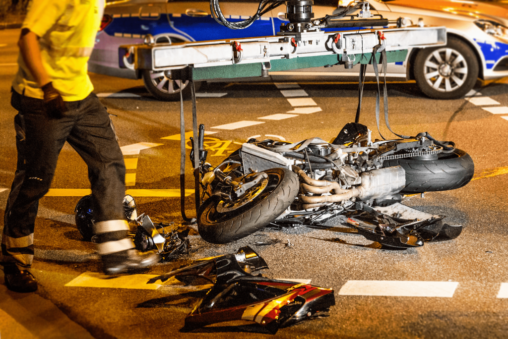 Motorcycle crash Image of a motorcycle on the road that has been wrecked, Issa Castro Law Firm.