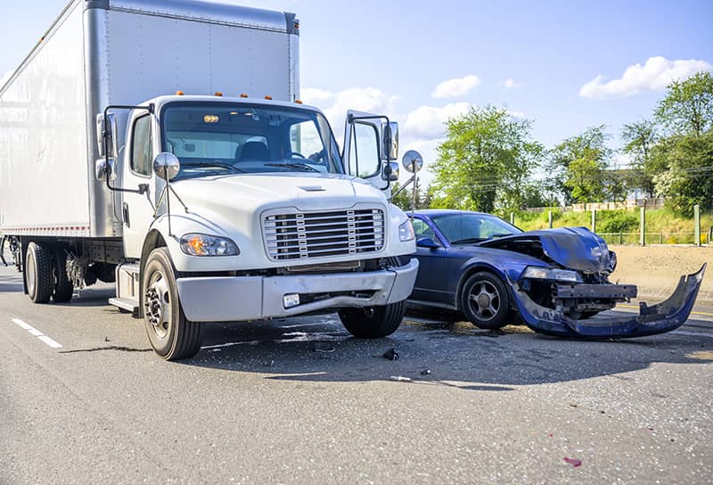 Road accident with damage to vehicles as a result of a collision Truck and car accident