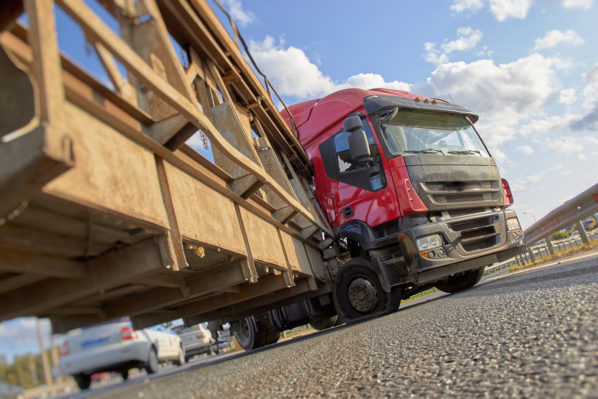 an exploding truck wheel caused an accident on the road.